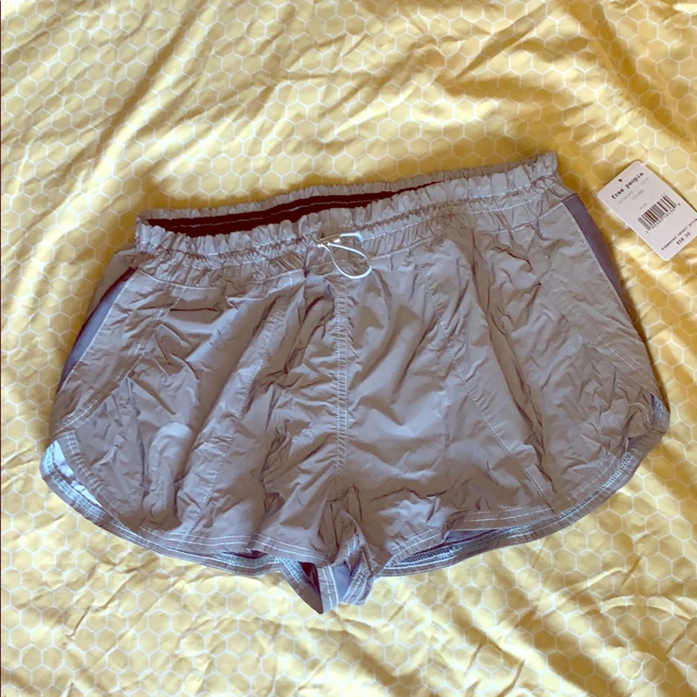 Free People silver athleisure shorts. Never worn!